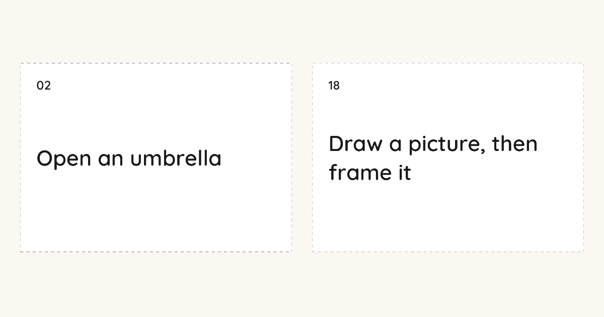 An enlarged view of actual card 2, Open an umbrella, beside card 18, Draw a picture, then frame it.