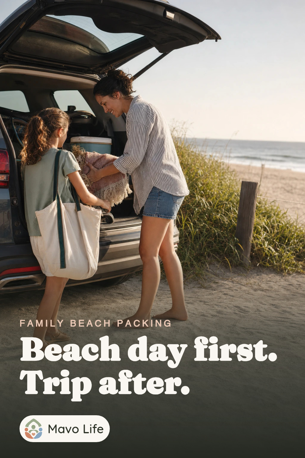 An adult and child pack beach towels and a canvas tote into an open car near low dunes. The image reads ‘Beach day first. Trip after.’