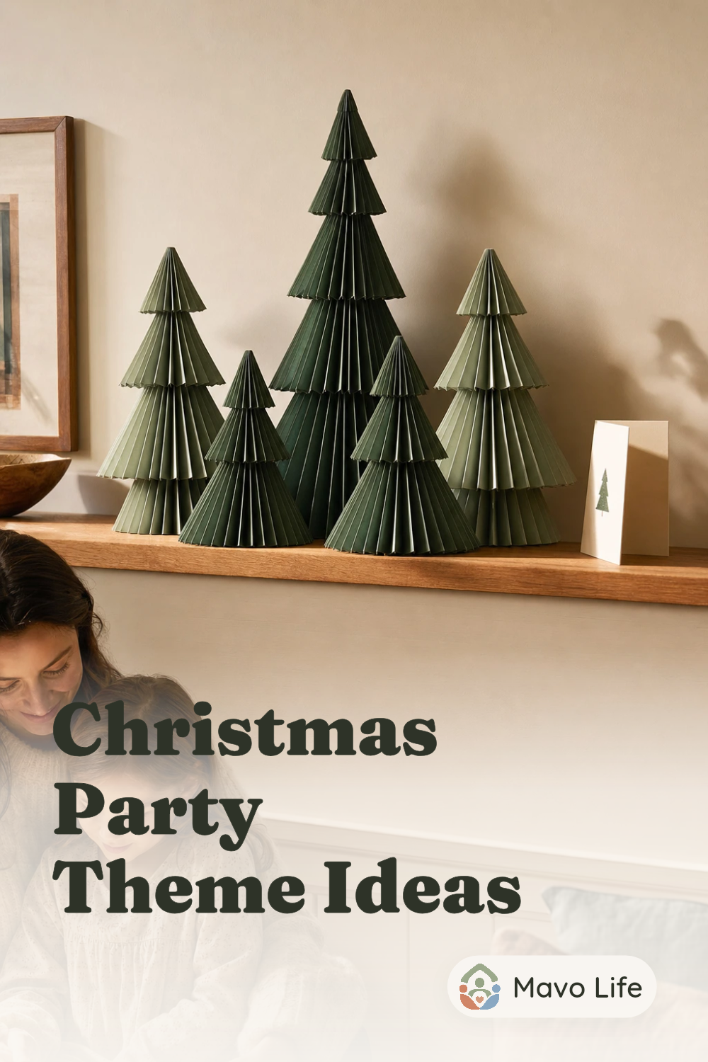 Five folded paper Christmas trees form a miniature forest on a wooden ledge, with an adult and child below. The image reads Christmas Party Theme Ideas.
